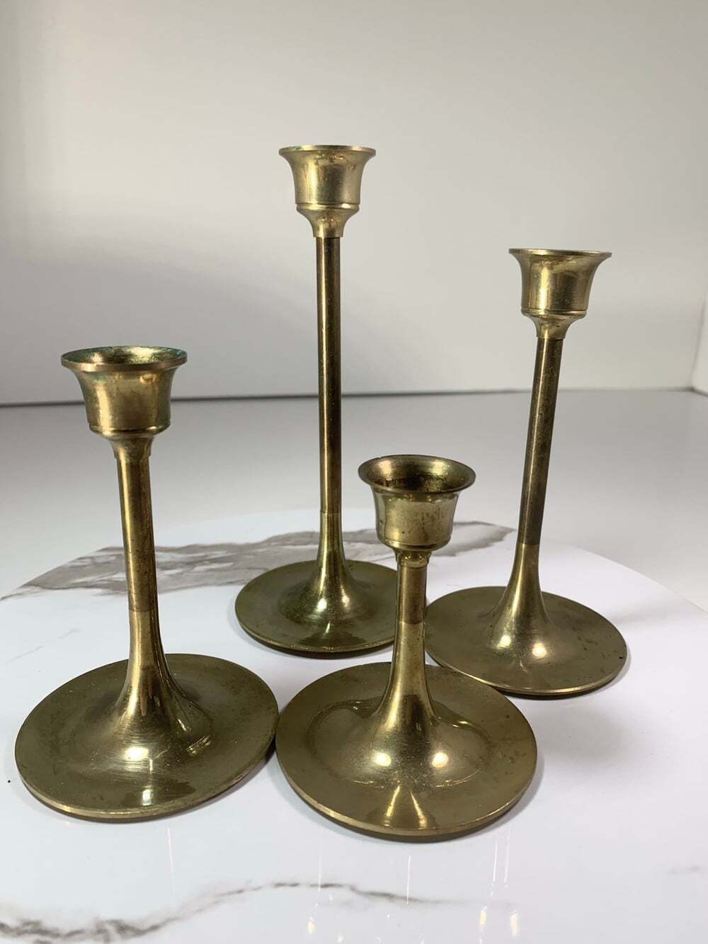 Brass Candle Holders Set of four varied sizes small candles vintage